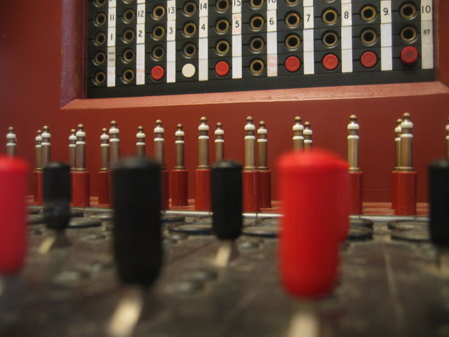 A manual switchboard with jack plugs