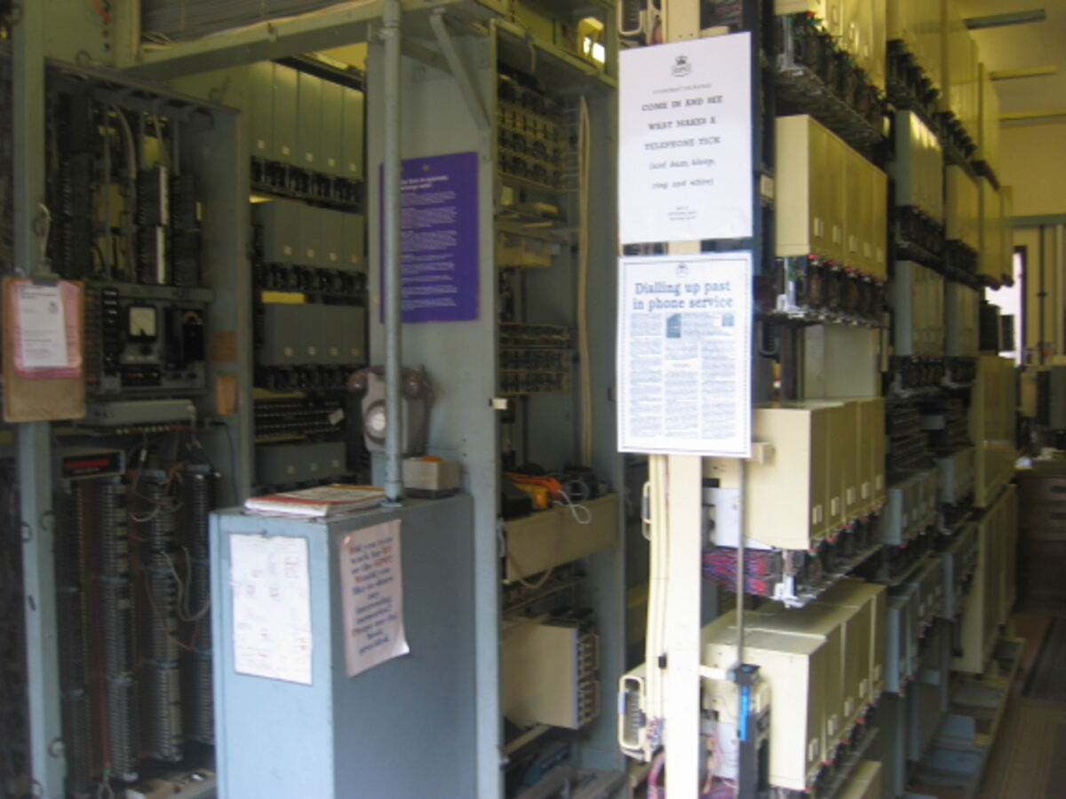 An aisle inside the exchange building, lined with equipment racks