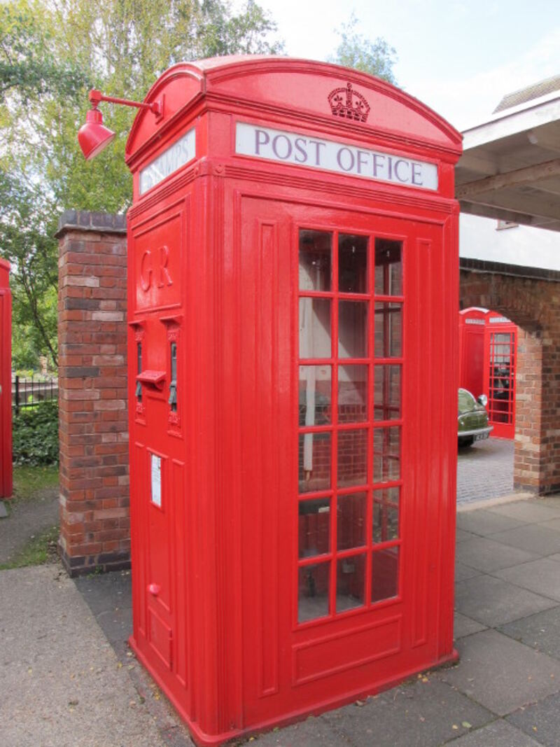 A K4 telephone kiosk, a large red box combining a phone and a post box